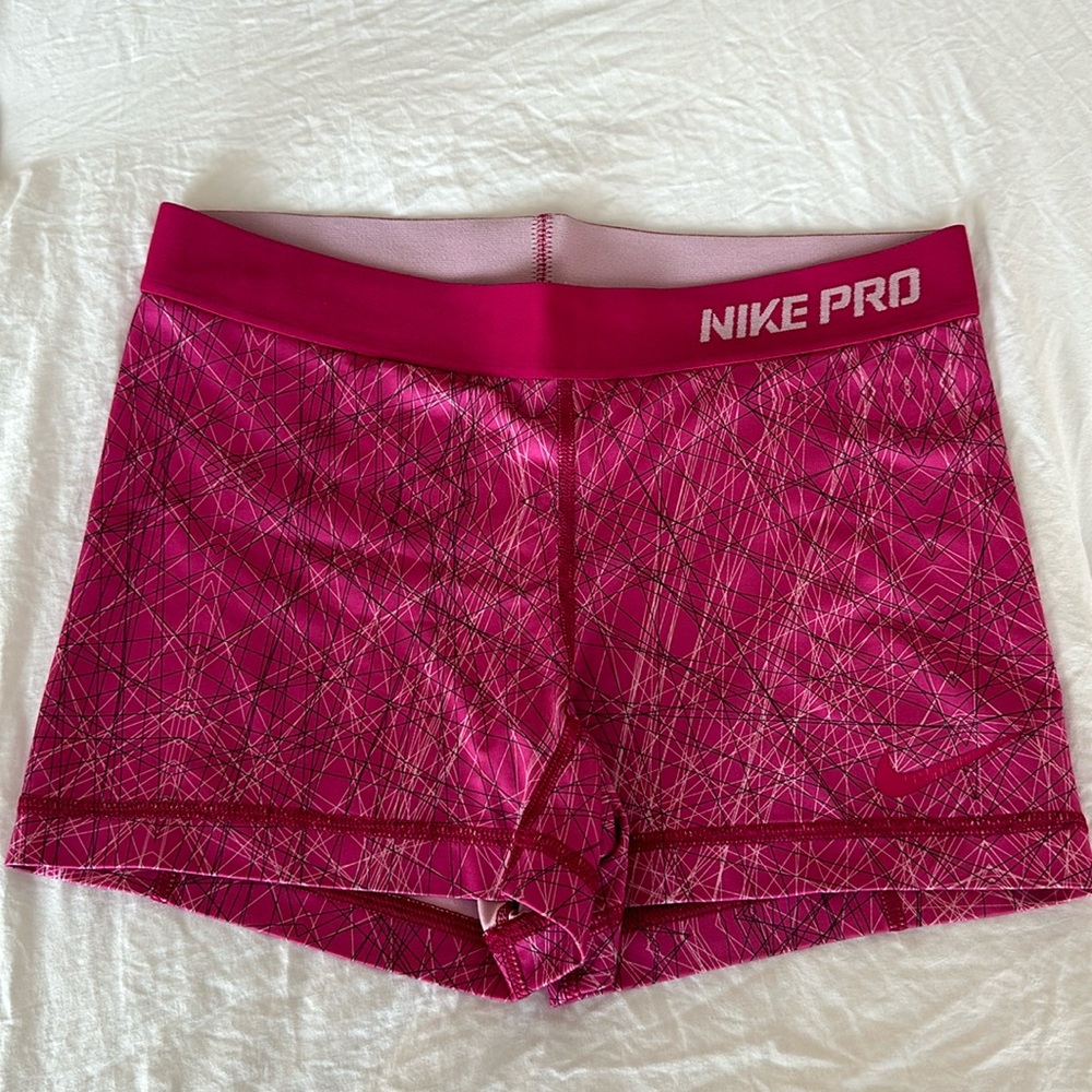Pink patterned Nike Pro shorts